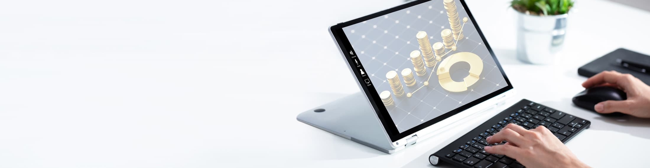 Professional workspace with a financial data visualization displayed on a computer screen.